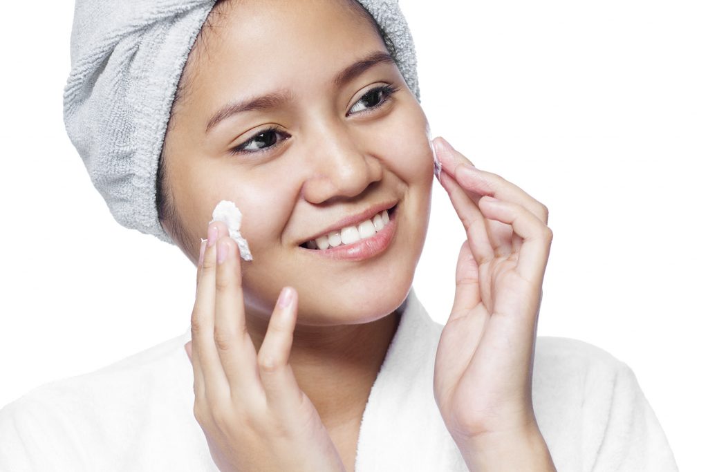 Woman Cleaning Face